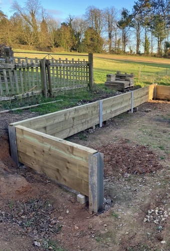 Sleeper retaining wall posts - sleeper,